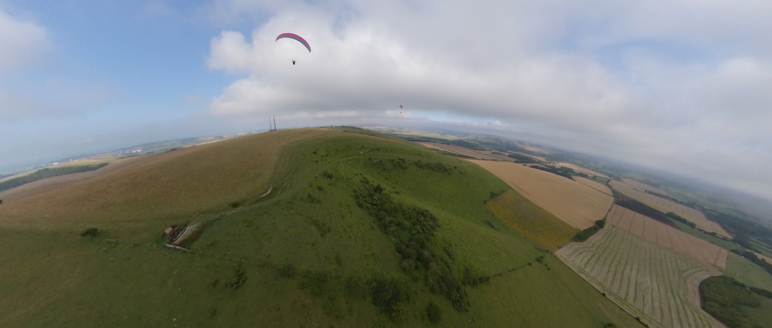 Tandem paragliding on the Sussex Downs in East Sussex