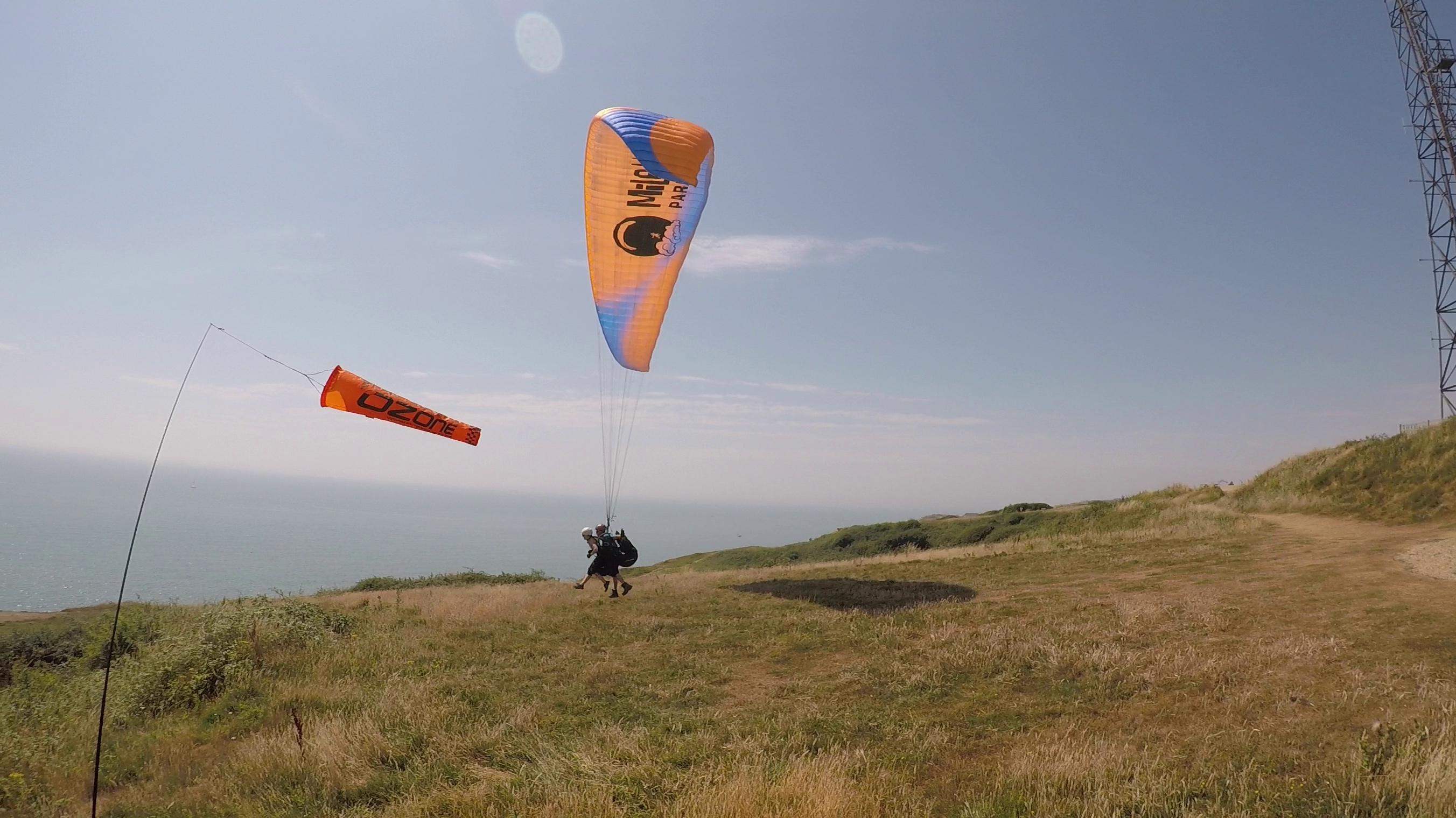 Taking off from Newhaven on a Tandem paragliding flight experience with Mile High Paragliding